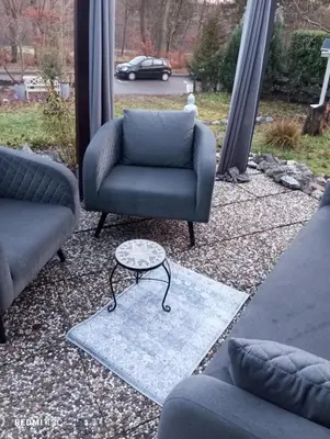 Ein Sitzbereich in der Unterkunft GOLF-Lodge