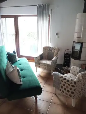Ein Sitzbereich in der Unterkunft GOLF-Lodge