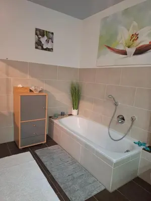 Ein Badezimmer in der Unterkunft Haus der Weinkönigin Kristina