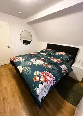 Ein Bett oder Betten in einem Zimmer der Unterkunft FeWo Rehborn