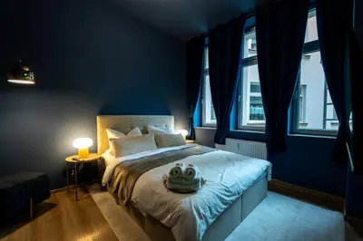 Ein Bett oder Betten in einem Zimmer der Unterkunft LLR Design Apartment - Satin Mood im Zentrum von Koblenz