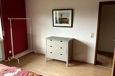 Ein Bett oder Betten in einem Zimmer der Unterkunft Rheinloge