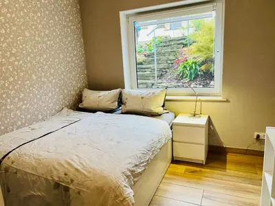 Ein Bett oder Betten in einem Zimmer der Unterkunft Moselromatik