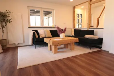 Ein Sitzbereich in der Unterkunft Ferienhaus Unter der Burg