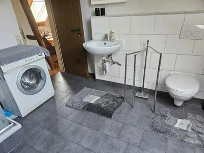 Ein Badezimmer in der Unterkunft Das Alte Kneipchen