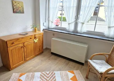 Ein Sitzbereich in der Unterkunft Ferienwohnung Zur Kasselburg