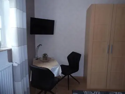 TV/Unterhaltungsangebot in der Unterkunft Zimmer Schmitz