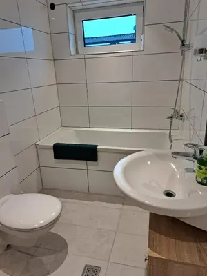 Ein Badezimmer in der Unterkunft Apartment Hermeskeil