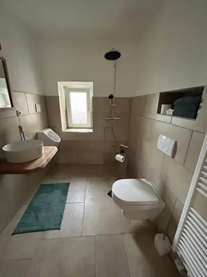 Ein Badezimmer in der Unterkunft Ferienhaus am Schloß