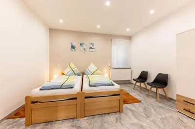 Ein Bett oder Betten in einem Zimmer der Unterkunft Rheinland Apartments - Stilvolle, moderne Unterkunft mit kostenfreiem WLAN und Parkplatz