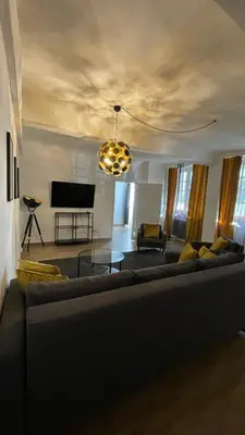 Ein Sitzbereich in der Unterkunft City Apartments Trier Suite 8