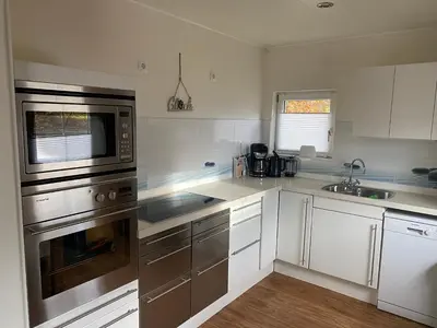 Küche/Küchenzeile in der Unterkunft EIFELCOTTAGE Zaunkönig