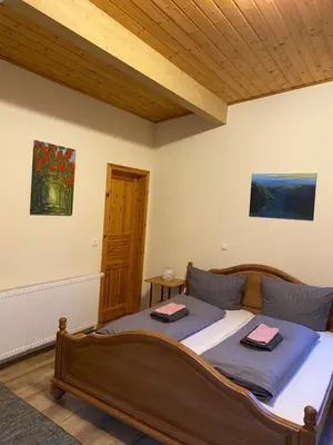 Ein Bett oder Betten in einem Zimmer der Unterkunft Ferienwohnung Eschbach Hof am Nürburgring