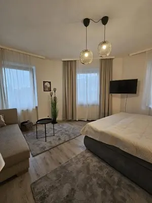 Ein Bett oder Betten in einem Zimmer der Unterkunft Moderne 2 Zimmer 70 qm Wohnung in Top Altstadtlage