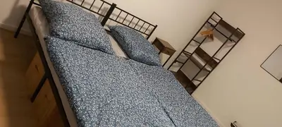 Ein Bett oder Betten in einem Zimmer der Unterkunft An der Stadtmauer