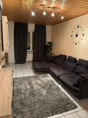 Ein Sitzbereich in der Unterkunft Familienzeit Apartament