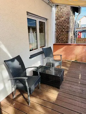 Ein Balkon oder eine Terrasse in der Unterkunft Familienzeit Apartament