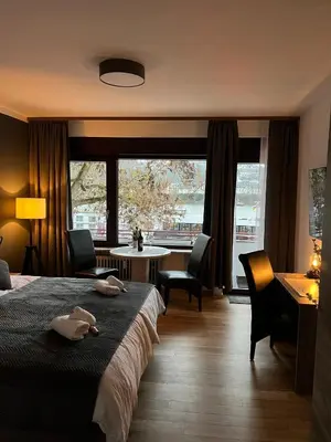 Ein Bett oder Betten in einem Zimmer der Unterkunft Rheinpanorama Suite mit Balkon