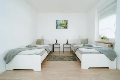 Ein Bett oder Betten in einem Zimmer der Unterkunft Eifel-Rast Mendig