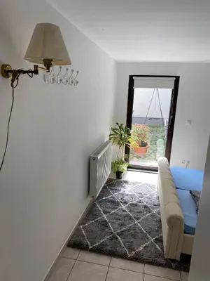 Ein Bett oder Betten in einem Zimmer der Unterkunft Ferienwohnung Eschbach Hof 2 am Nürburgring