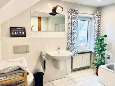Ein Badezimmer in der Unterkunft Ferienwohnung CURB