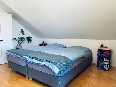 Ein Bett oder Betten in einem Zimmer der Unterkunft Ferienwohnung CURB