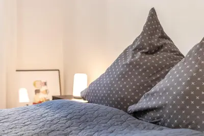 Ein Bett oder Betten in einem Zimmer der Unterkunft Gemütliche und günstige Stadtwohnung für 4 Personen in Mayen