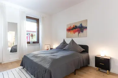 Ein Bett oder Betten in einem Zimmer der Unterkunft Gemütliche und günstige Stadtwohnung für 4 Personen in Mayen