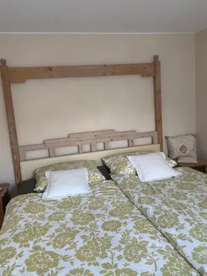 Ein Bett oder Betten in einem Zimmer der Unterkunft Waldlodge