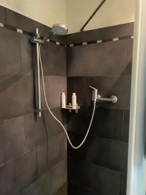 Ein Badezimmer in der Unterkunft Waldlodge