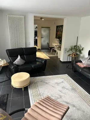 Ein Sitzbereich in der Unterkunft schöne Ferienwohnung mit Terasse