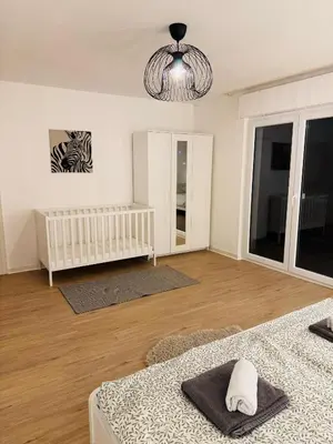 Ein Bett oder Betten in einem Zimmer der Unterkunft Familien Ferienhaus in der Vulkaneifel -Mechthild-