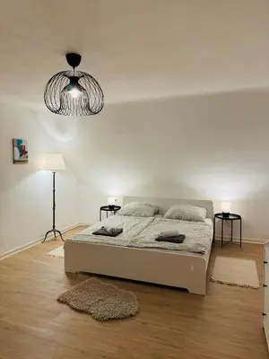 Ein Bett oder Betten in einem Zimmer der Unterkunft Familien Ferienhaus in der Vulkaneifel -Mechthild-