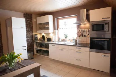 Küche/Küchenzeile in der Unterkunft Ferienwohnung Am Korretsberg
