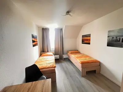 Ein Bett oder Betten in einem Zimmer der Unterkunft Monteurwohnung Natalie