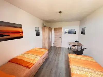 Ein Bett oder Betten in einem Zimmer der Unterkunft Monteurwohnung Natalie