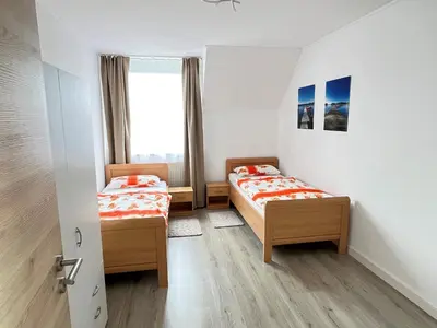 Ein Bett oder Betten in einem Zimmer der Unterkunft Monteurwohnung Natalie