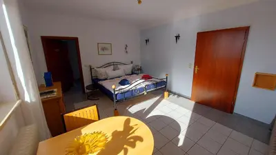 Ein Bett oder Betten in einem Zimmer der Unterkunft Villa Gast - Salmagundi, für Gruppen bis 16 Gäste