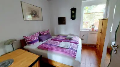 Ein Bett oder Betten in einem Zimmer der Unterkunft Villa Gast - Salmagundi, für Gruppen bis 16 Gäste