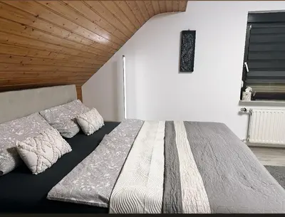 Ein Bett oder Betten in einem Zimmer der Unterkunft Blick auf den Rhein