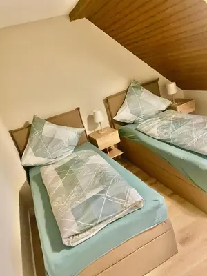 Ein Bett oder Betten in einem Zimmer der Unterkunft Apartment Dobias