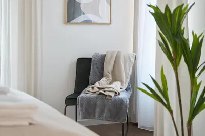 Ein Bett oder Betten in einem Zimmer der Unterkunft BG Living & Hosting - Stilvolle Ferienwohnung im Zentrum von Wittlich - 2 Schlafzimmer, Netflix, Waschmaschine, bis 4 Personen