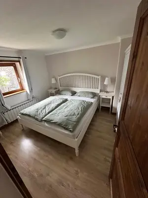 Ein Bett oder Betten in einem Zimmer der Unterkunft FeWo Moselruhe