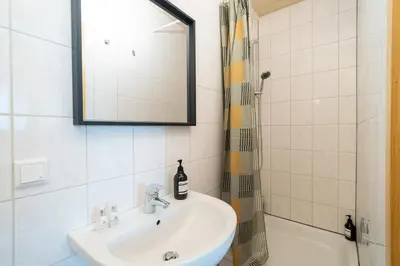 Ein Badezimmer in der Unterkunft Modernes City-Studio Universität Koblenz