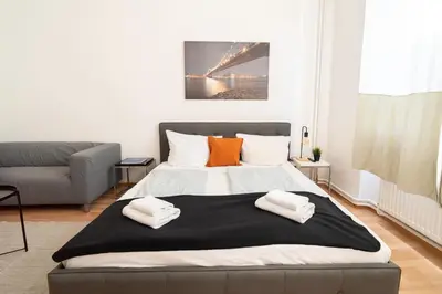 Ein Bett oder Betten in einem Zimmer der Unterkunft Modernes City-Studio Universität Koblenz