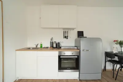 Küche/Küchenzeile in der Unterkunft Modernes City-Studio Universität Koblenz