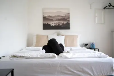 Ein Bett oder Betten in einem Zimmer der Unterkunft Modernes City-Studio Universität Koblenz