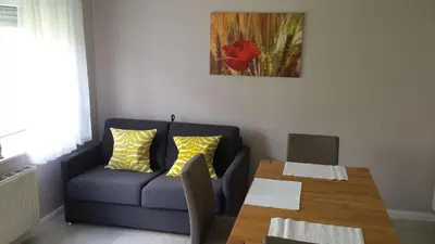 Ein Sitzbereich in der Unterkunft Ferienwohnung Ewa
