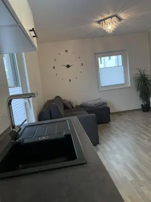 Ein Sitzbereich in der Unterkunft Ruhige 5 Sterne Ferienwohnung Terrasse & Aussicht stilvoll & modern