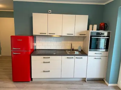 Küche/Küchenzeile in der Unterkunft Zentrale Neubauwohnung mit Balkon